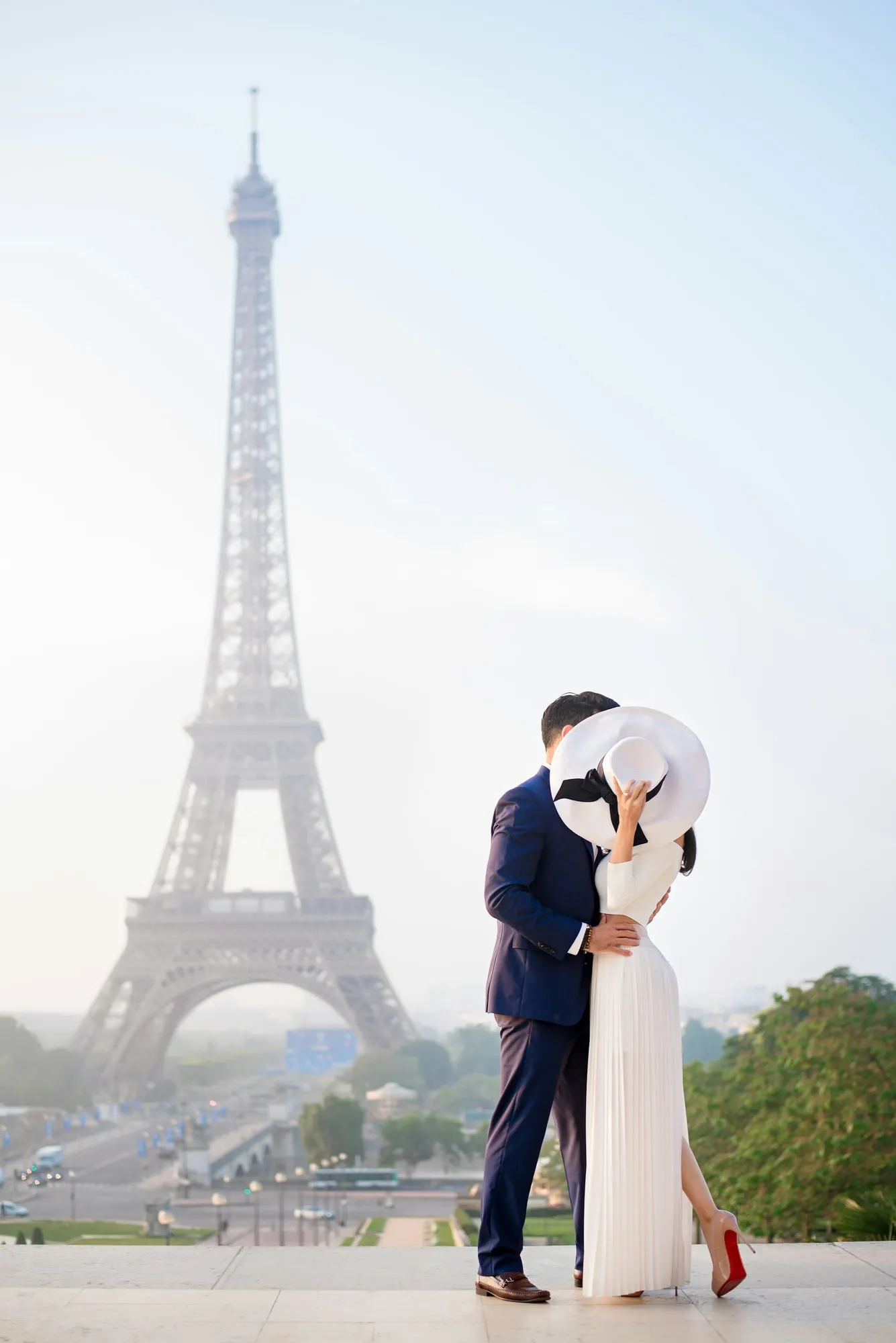 The couple in front of the Eiffel Tower