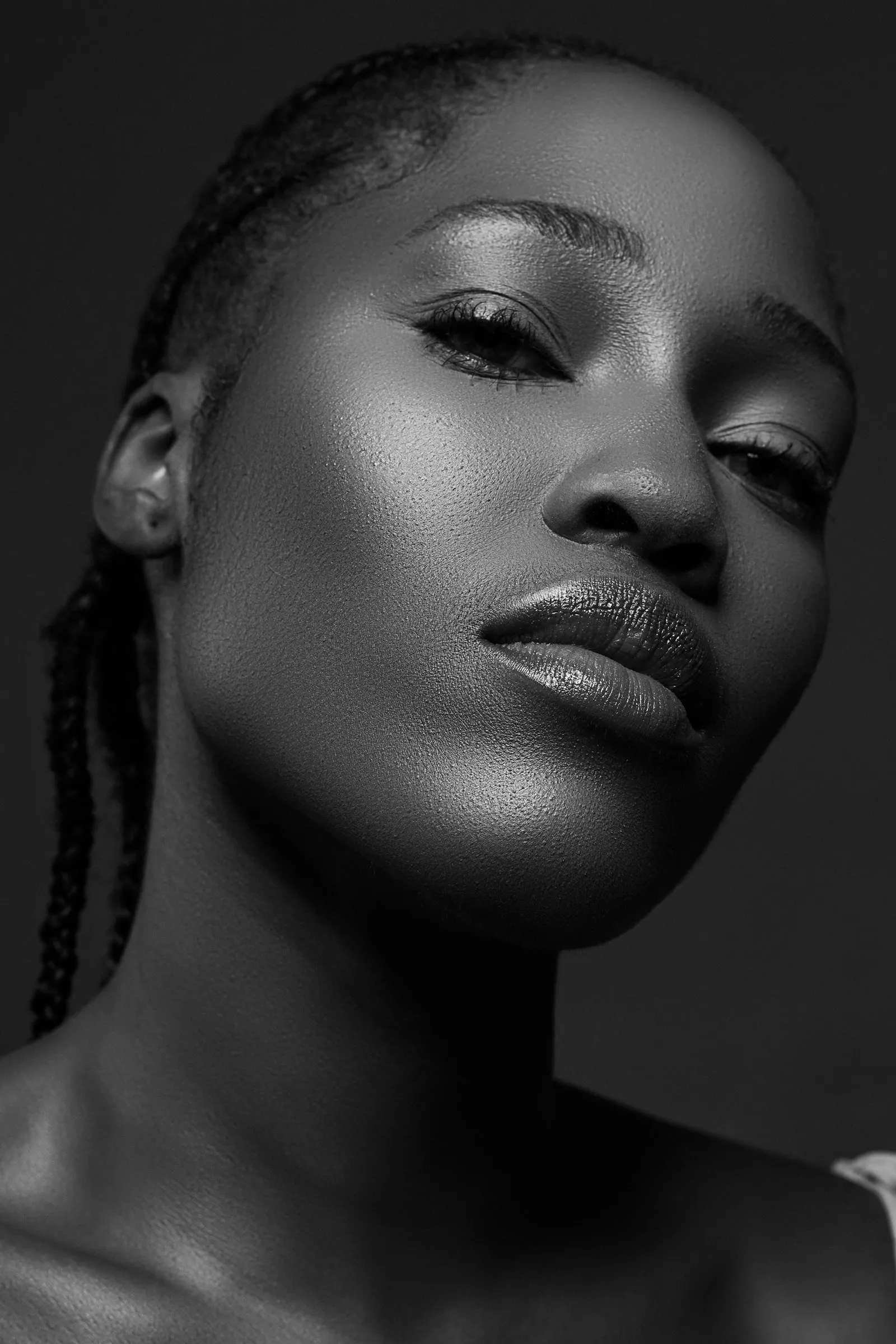 Beauty portrait with cornrows, black and white